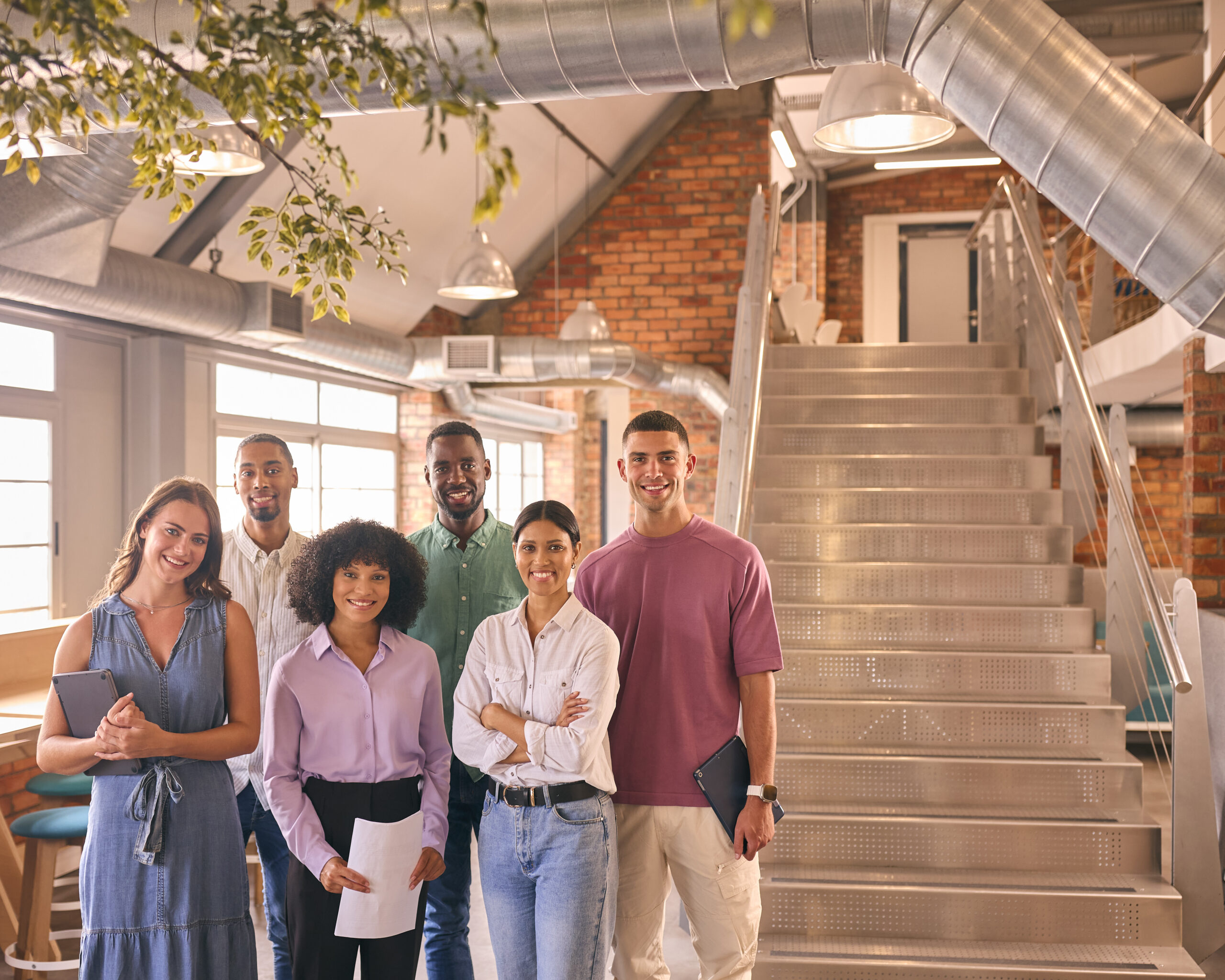 Group of professionals in a modern office, symbolizing a fresh career move and new opportunities.
